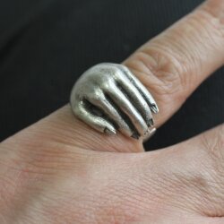 Hand Holding Ring Silver