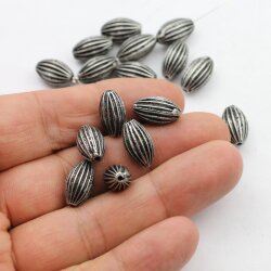 10 Dark Antique Silver Corrugated Oval Beads