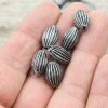 10 Dark Antique Silver Corrugated Oval Beads