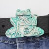 Gürtelschnalle Frosch, patina