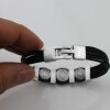 Leather bracelet, with metal elements