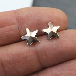 Sterling Silver stud Star earrings with crystals from...