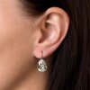 Elegant earrings with sparkling pear-shaped Swarovski crystals in an antique brass frame. Perfect for special occasions and as a stylish accessory for everyday wear.