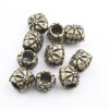 10 Flower Beads, antique brass