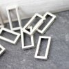 10 Tetragon Pendants, antique silver