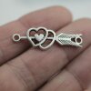 10 arrow through Heart Pendants, charms