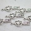 10 arrow through Heart Pendants, charms