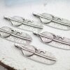 5 Feather Pendants