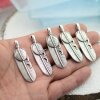 5 Feather Pendants