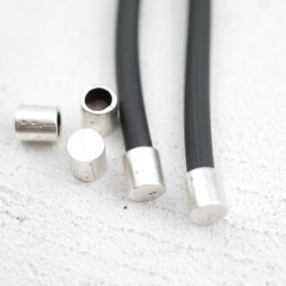 10 Endkappen fr Leder, Altsilber