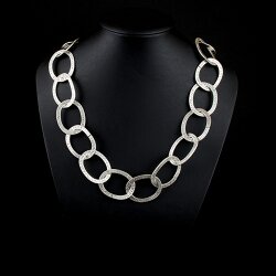 Necklace with oval metal elements