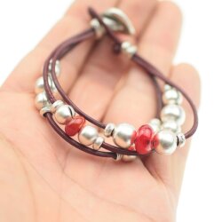 Ethno style Bracelet with ruby red beads and metal elements