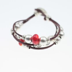 Ethno style Bracelet with ruby red beads and metal elements