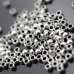 250 Brass beads 4 x 2,8 mm (Ø 2,2 mm)