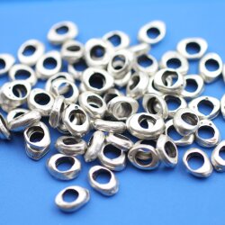 50 Metal Beads 9 x 6 mm (Ø 4 mm)