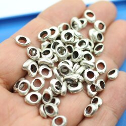 50 Metal Beads 9 x 6 mm (Ø 4 mm)