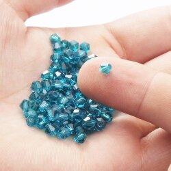 4 mm, Bicone Xilion Swarovski Beads - 20 pcs.