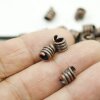 20 Spacer beads, antique copper