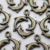 10 Antique Brass Dolphin Charms