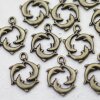 10 Antique Brass Dolphin Charms