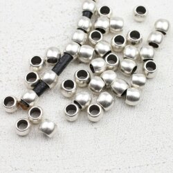 50 Metal Beads 7x5 mm (Ø 4 mm), antique silver