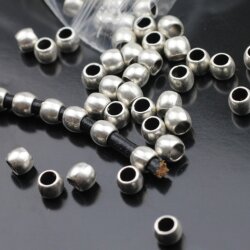 50 Metal Beads 7x5 mm (Ø 4 mm), antique silver