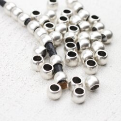 50 Metal Beads 7x5 mm (Ø 4 mm), antique silver