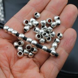 50 Metal Beads 7x5 mm (Ø 4 mm), antique silver