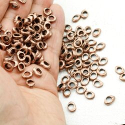 50 Metal Beads 9 x 6 mm (Ø 4 mm), antique copper