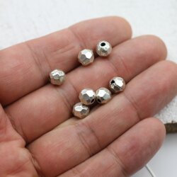 10 Stk. Facetten Perlen 7 mm, altsilber