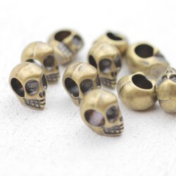 10 Totenkopf Perlen, altmessing