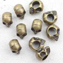 10 Totenkopf Perlen, altmessing