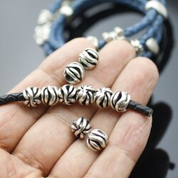 10 floral Beads, antique silver