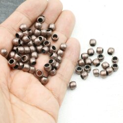 50 Metal Beads 7x5 mm (Ø 4 mm), antique copper