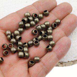 50 Metallperlen 7x5 mm ( 4 mm), altmessing