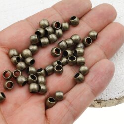 50 Metal Beads 7x5 mm (Ø 4 mm), Antique Brass