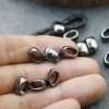 10 metal Sliderbeads 11x7 mm, Jet Hematite