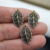 10 Leaf Charms antique brass