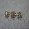 10 Leaf Charms antique brass